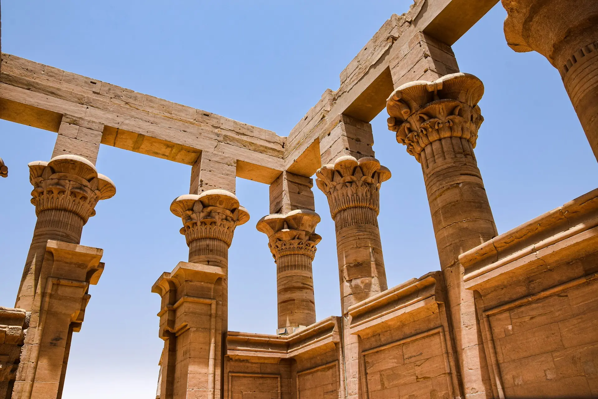 a group of stone pillars in a building